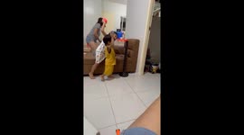 Toddlers learn how to play basketball with indoor mini toy net