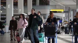 US: Thanksgiving Holiday Travelers Go Through LaGuardia Airport