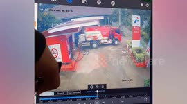 Fire engulfs petrol station while pumps are being refilled