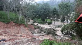 Roads inundated with flash floods amid rain in southern Thailand
