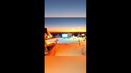 Breathtaking sunset cheers up skiers in China's Xinjiang