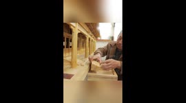 Chinese carpenter crafts iconic building of Forbidden City in miniature