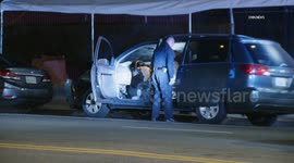 US, Los Angeles: Adams Normandie LAPD Officers Struck By Hit And Run Driver