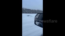 Speeding Through Snow in the Ditch: Watch to the end, dude is smoking a joint while stunt driving! LMAO #funny