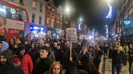 Kurdish community protest police raid on community centre in north London