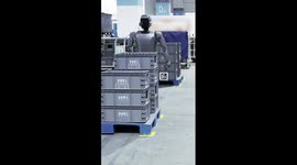 Humanoid robots team up with unmanned vehicles in automated logistics