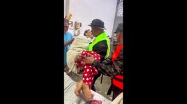 Elderly woman trapped by floodwater at home rescued in Thailand