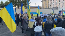 Some members of the Ukrainian community in Rome hold up Ukrainian flags as they demonstrate against Russia on the occasion of the 1000 days of the start of the Russian-Ukrainian war, in Rome.