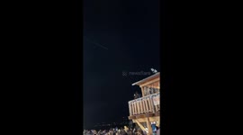 Flying santa riding a sleigh and waving to people in Montreux, Switzerland
