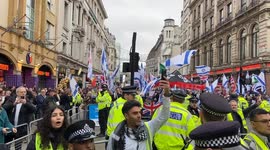 Chaotic scenes in Piccadilly Circus in London as thousands of Palestine protesters march past Israel supporters staging a counter-protest