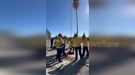 Woman rescued from 20ft deep manhole in California