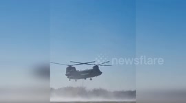 Army helicopter retrieves vehicles swept away by floods in Spain