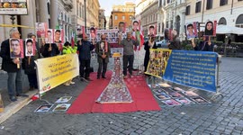 Activists from the National Council of Resistance of Iran in Italy protest against capital executions in Iran at a sit-in in Rome.