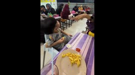 Child's joyful reaction to Spiderman toy in Indonesia