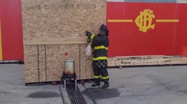 Firemen show how frying a turkey can cause a kitchen fire