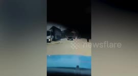 Roads submerged in flood as storm batters the Philippines