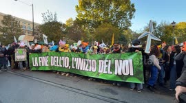 Climate and environmental protesters display a banner with the slogan ‘the end of the self, the beginning of us’ at the Climate Pride in Rome.