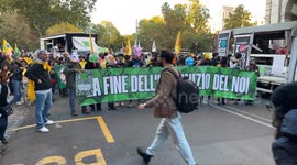 Climate and environmental protesters display a banner with the slogan ‘the end of the self, the beginning of us’ at the Climate Pride in Rome.