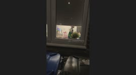 Kid dancing inside house caught by onlookers in London, England, UK