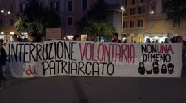 Women hold a banner with the slogan ‘voluntary interruption of patriarchy’ during a demonstration for the right to abortion organized by the Not One Less movement in Rome.