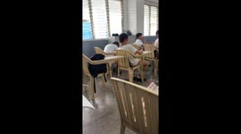 Puppy napping inside the bag during class