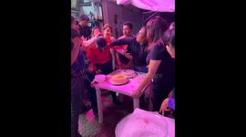 Sister's face pushed into cake in Mexico City, Mexico