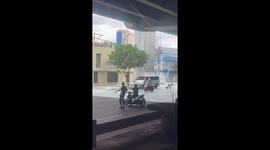 Kind scooter rider helps disabled boy cross road safely