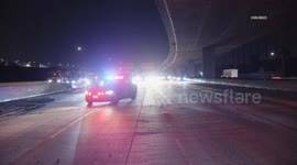 US, Los Angeles: Diamond Bar Semi Truck Jackknifes After Crashing Into Divider on WB 60 Freeway