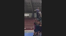 Daring cheerleading stunt goes awry when one slips down human tower