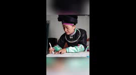 Exquisite embroideries on China's Zhuang ethnic costumes