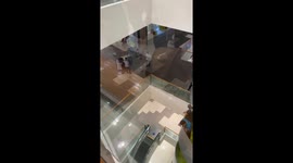 Shopping mall ceiling turns into waterfall as rainwater leaks through
