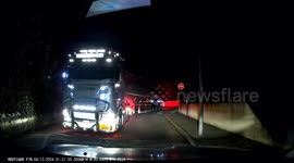 Beautiful truck in the night. Dash cam from my car. In an small road, a big shiny truck