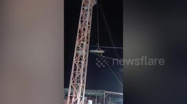 Driver found dead 'with his pants pulled down' in crane cabin at construction site