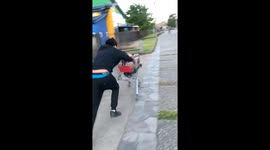Boys having fun with shopping cart but fail in Los Lagos, Chile