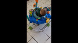 Baby bouncing himself to stay awake after Mom says it’s time to go to sleep