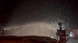 Snow ploughs battle through blizzards in New York