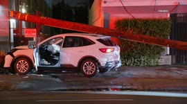 US, Los Angeles: Studio City Utility Pole Falls Onto Car After Driver Crashes Into It