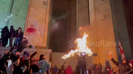 Protesters set alight effigy in front of Georgian Parliament in Tbilisi