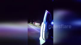 Cop's hand stuck under tyre when 'drunk driver' crashes