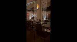 Polite Raccoon Eats Leftovers At Restaurant