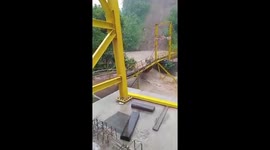 Raging flood washes away bridge in Indonesia