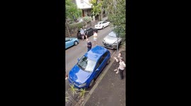 The moment a Recycling Truck rolls through a $3.47 million house auction in Sydney