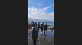 Unexpected big wave splashes people in Cartagena, Chile