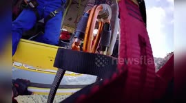 Helicopter team saves walker and his pet dog in Spain