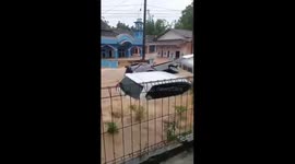 Cars washed away by flash floods amid heavy rain in Indonesia