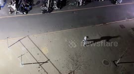 Perfectly-timed gust of wind creates leaf whirlwind around sword cosplayer