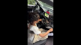 Seven-year-old schoolgirl shows off her camera skills for advertising shoot