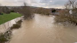 Storm Darragh causes the river Severn to break its banks in Newtown Powys.
