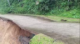 Road collapses as storms causes landslides and floods in Indonesia