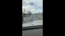 Runaway wheel rolls down motorway in Thailand